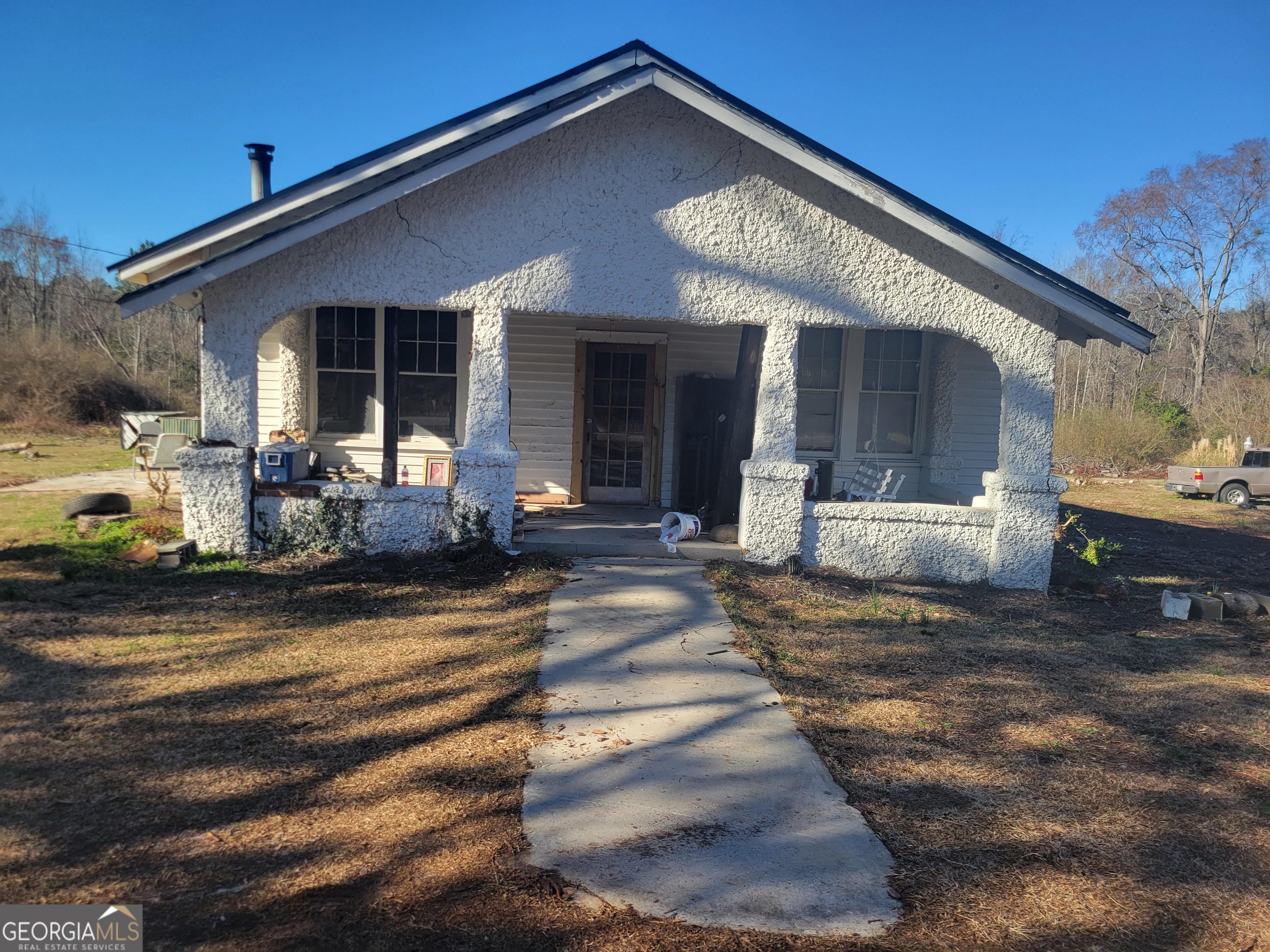 a view of a house with a patio