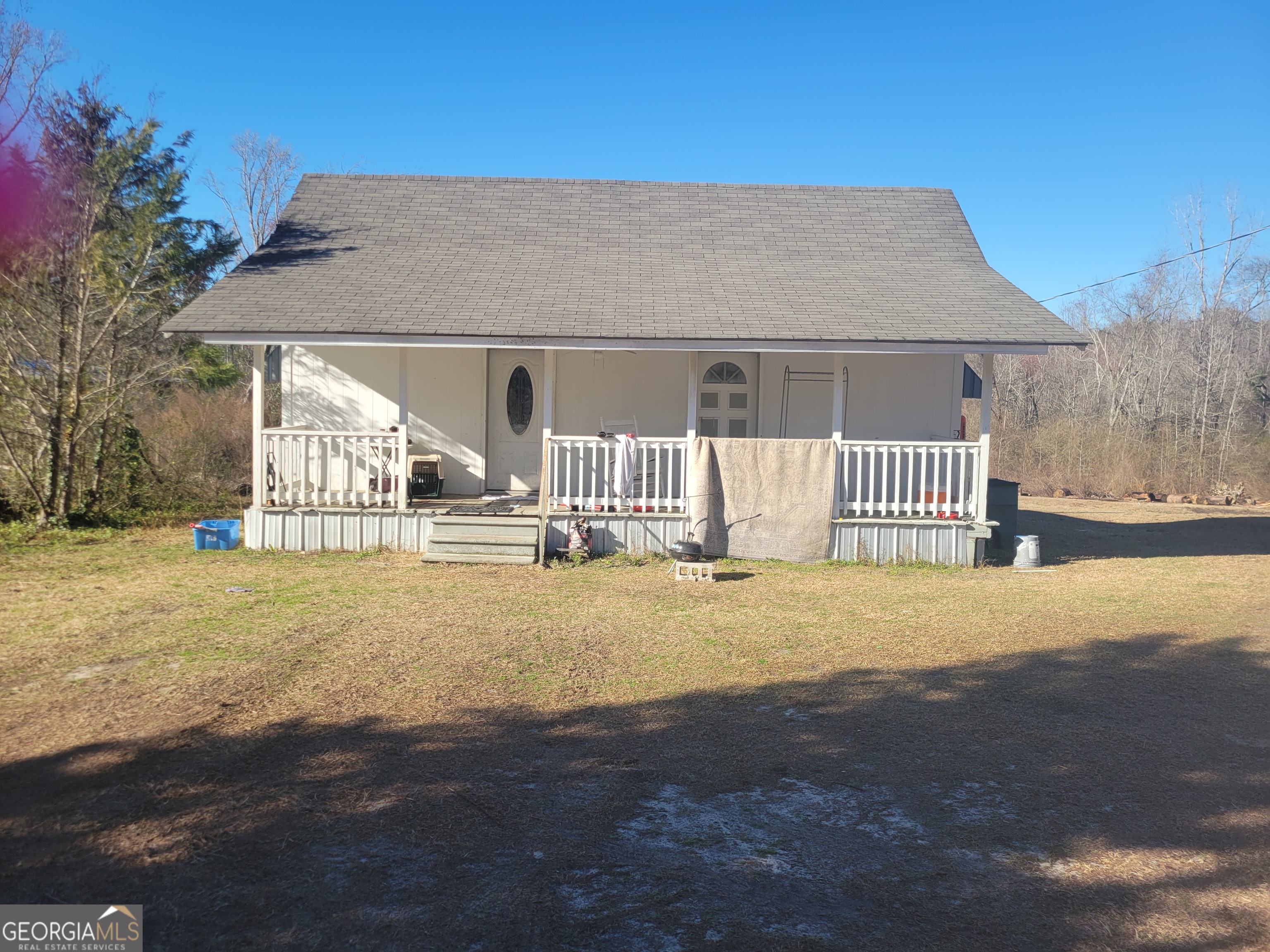 2131 Rockledge Road Rockledge, GA 30454 - Photo 2 of 2 a front view of a house with a yard