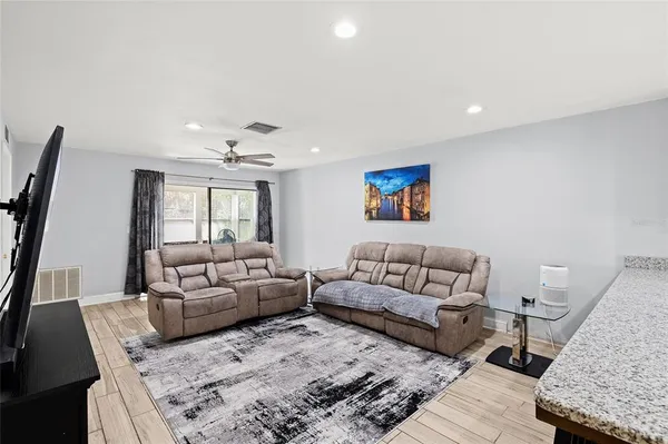 a living room with furniture and a couch