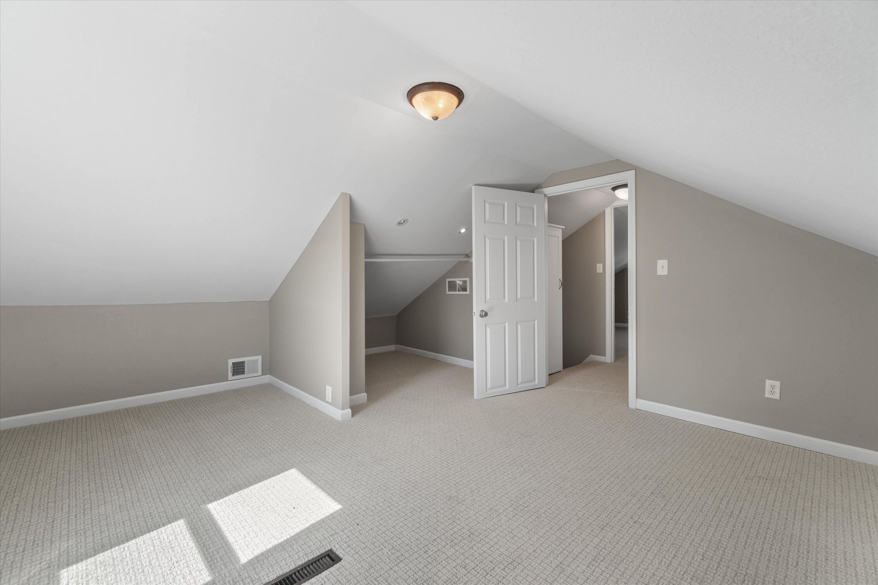 N39W27485 Hillside Grove Road Pewaukee, WI 53072 - Photo 13 of 43 Upstairs bedroom