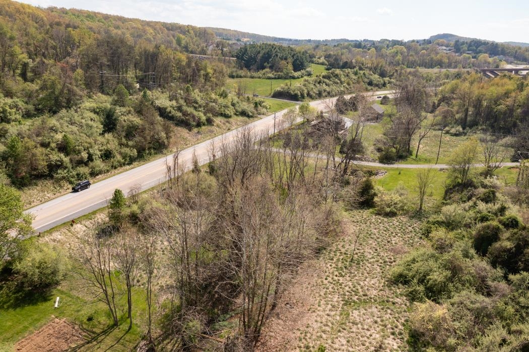 496 Old Greenville Road Staunton, VA 24401 - Photo 15 of 68 a view of a lake with a mountain in the background