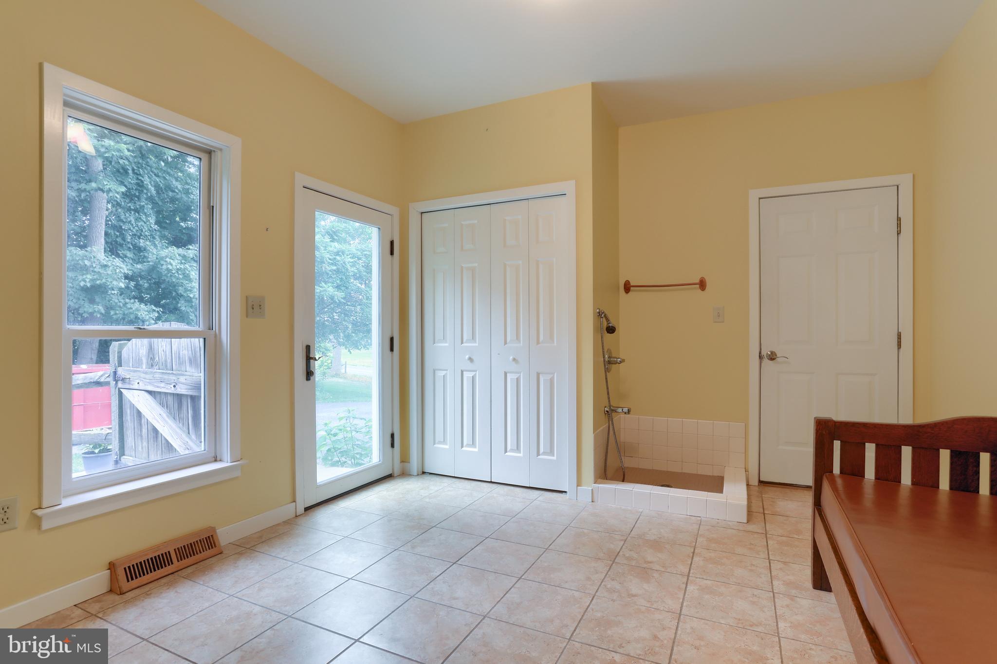 146 Rexmont Road Lebanon, PA 17042 - Photo 28 of 55 Side entry mudroom, doggy door & pet bathing area