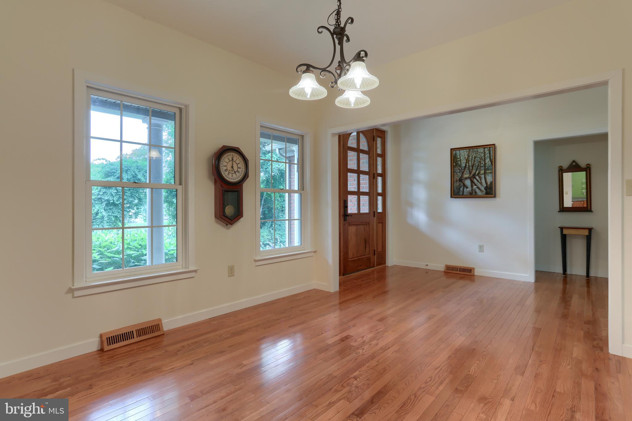 Dining room open to main entrance, hardwood