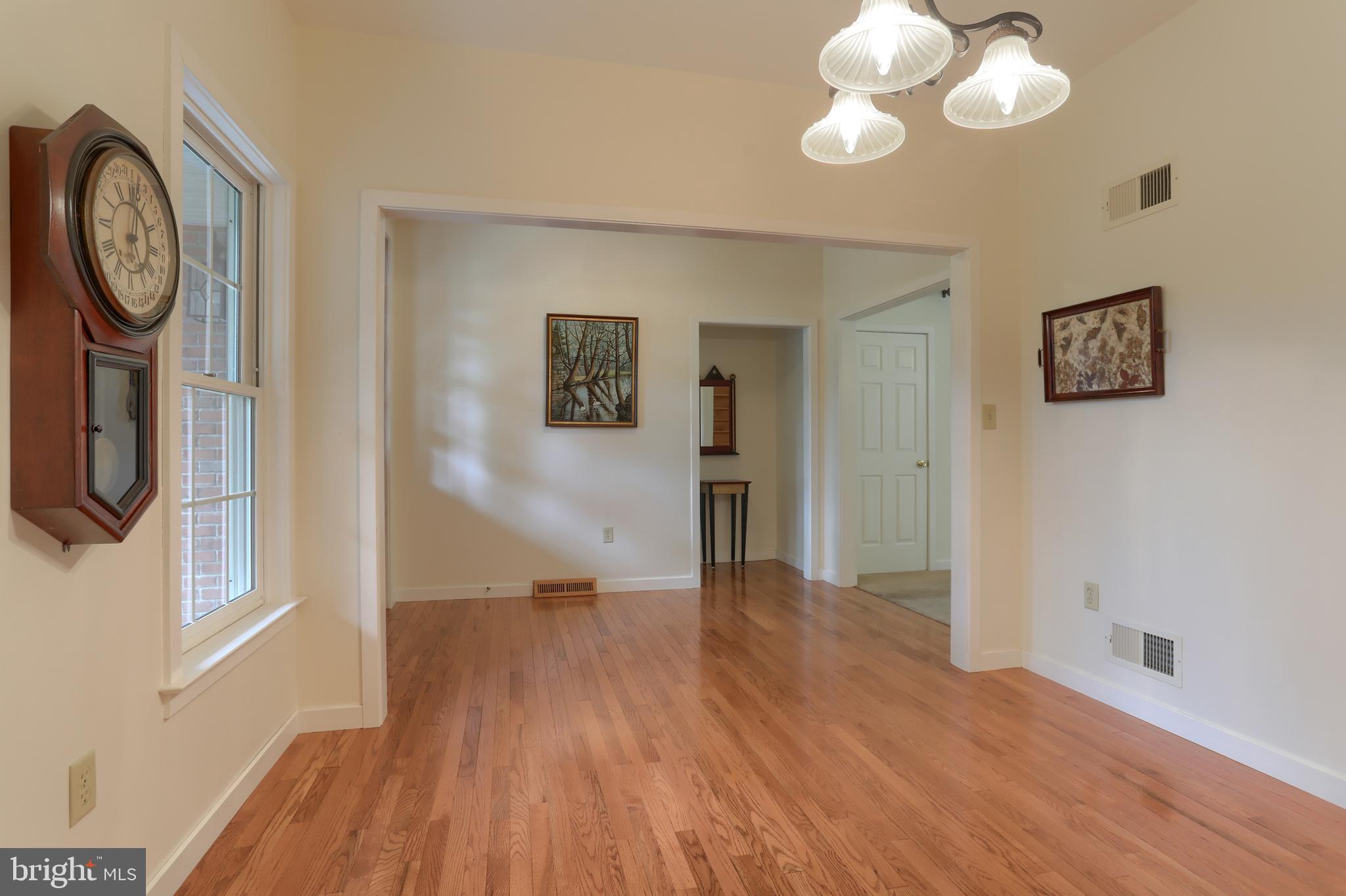 Dining room or office area, hardwood flooring