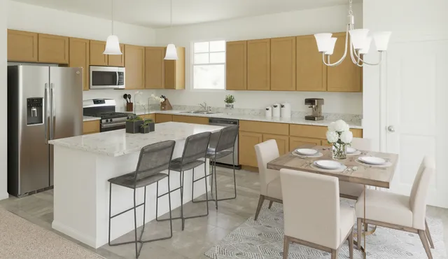 a kitchen with granite countertop a sink cabinets stainless steel appliances and a center island