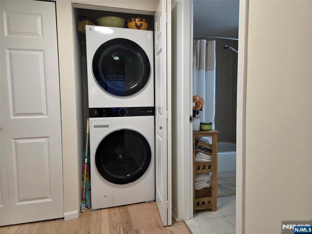 100 Old Palisade Road, Unit 803 Fort Lee, NJ 07024 - Photo 15 of 16 a utility room with dryer and washer