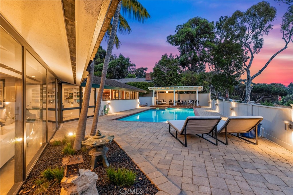 Palos Verdes Peninsula, 90274 - Photo 12 of 47 a view of a chairs and table in backyard