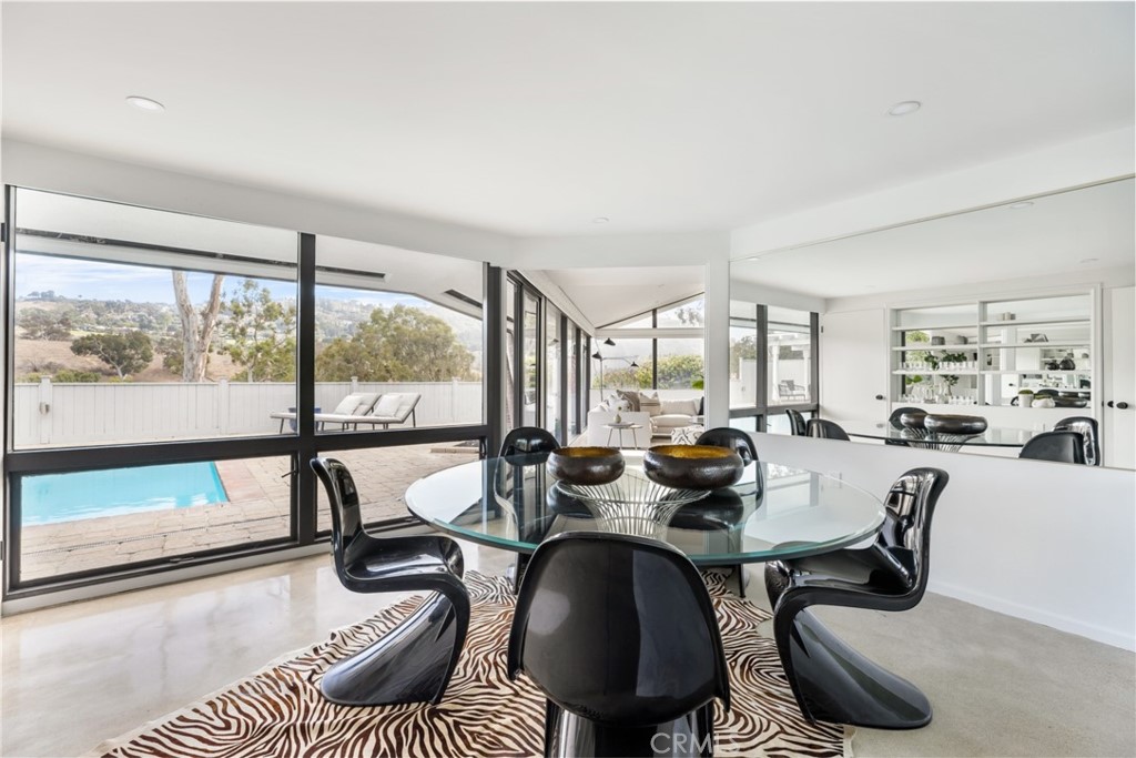 Palos Verdes Peninsula, 90274 - Photo 16 of 47 a view of a dining room with furniture window and outside view