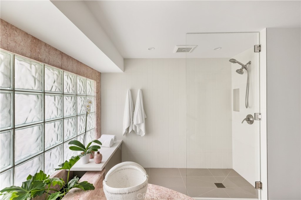 Palos Verdes Peninsula, 90274 - Photo 30 of 47 a white toilet sitting next to a bathroom sink