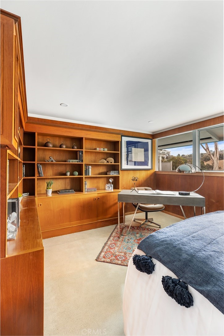 Palos Verdes Peninsula, 90274 - Photo 37 of 47 a living room with furniture a rug and white walls