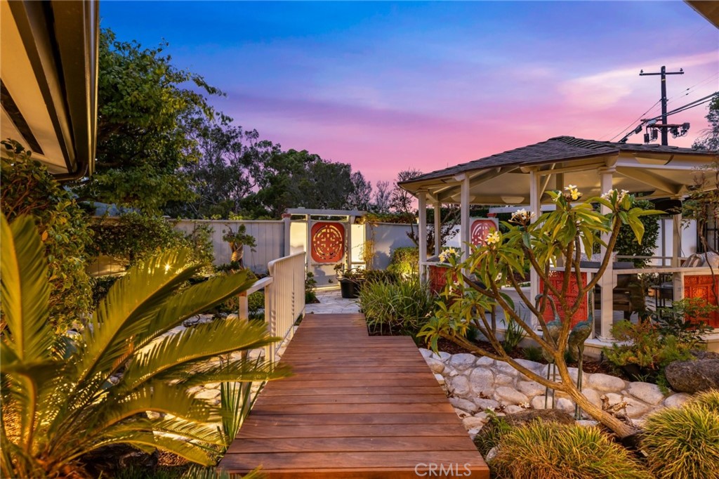 Palos Verdes Peninsula, 90274 - Photo 39 of 47 a front view of a house with a yard