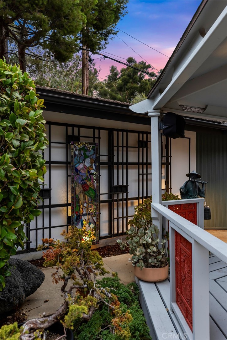 Palos Verdes Peninsula, 90274 - Photo 40 of 47 a view of a porch with a flower garden