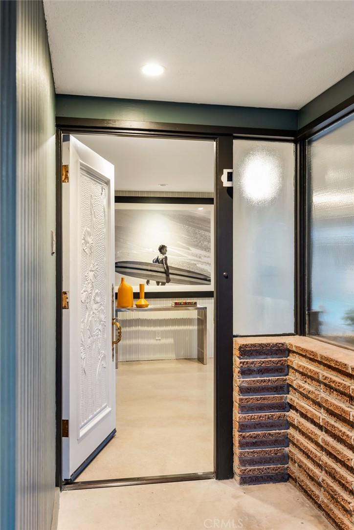 Palos Verdes Peninsula, 90274 - Photo 4 of 47 a kitchen with granite countertop a refrigerator and a glass door