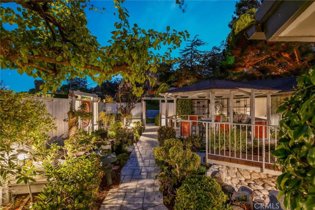 Palos Verdes Peninsula, 90274 - Photo 42 of 47 a front view of a house with a yard