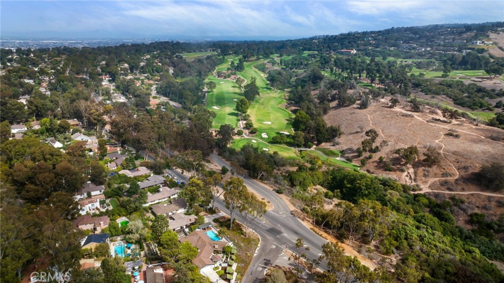 Palos Verdes Peninsula, 90274 - Photo 46 of 47 an aerial view of residential houses with outdoor space and trees