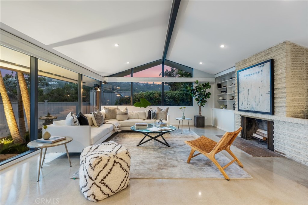 Palos Verdes Peninsula, 90274 - Photo 6 of 47 a living room with fireplace furniture and a flat screen tv