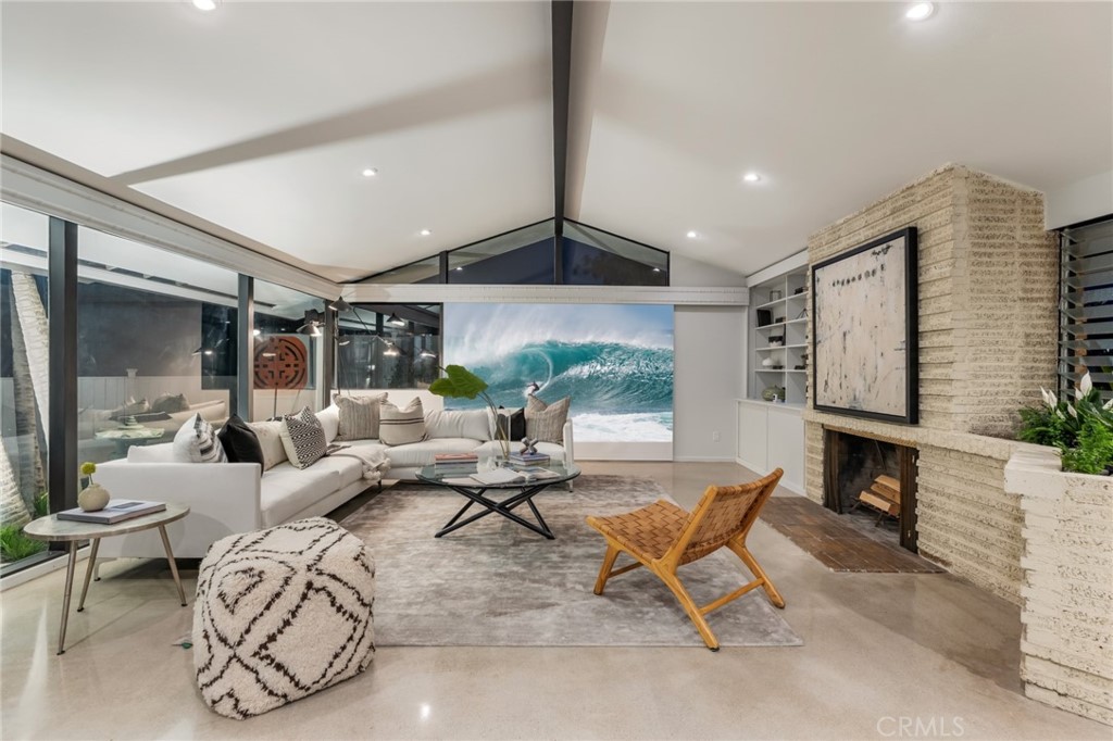 Palos Verdes Peninsula, 90274 - Photo 7 of 47 a living room with patio furniture and a large window