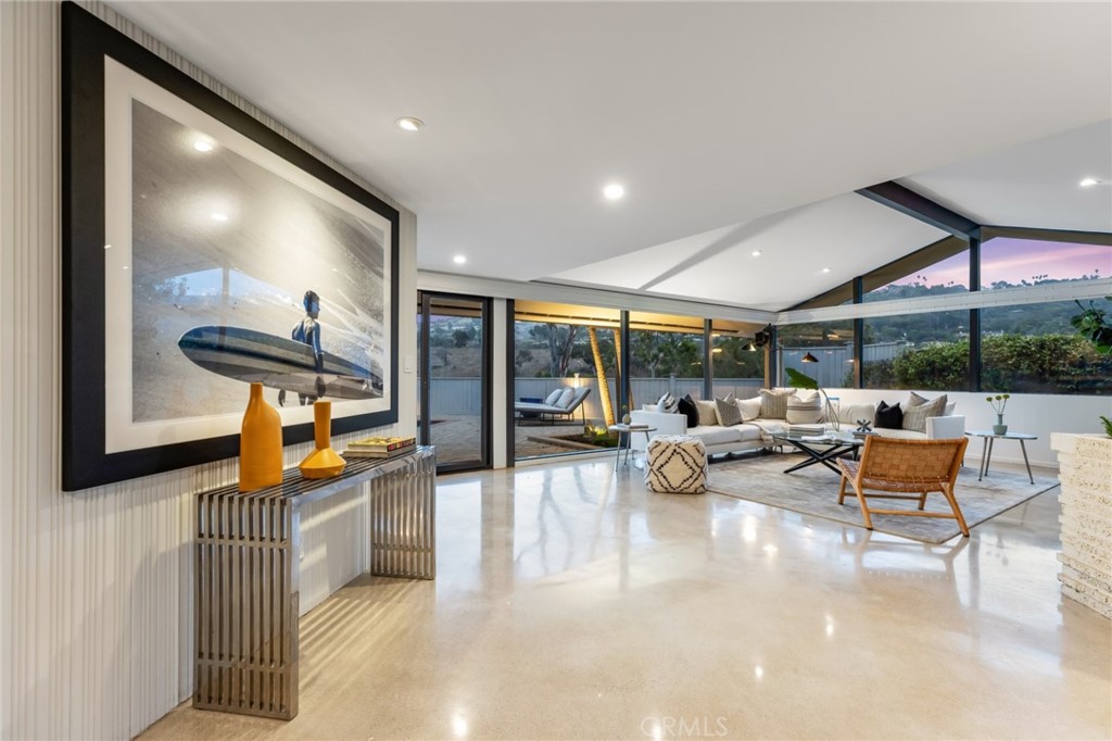 Palos Verdes Peninsula, 90274 - Photo 9 of 47 a very nice looking living room with a large window and a fireplace