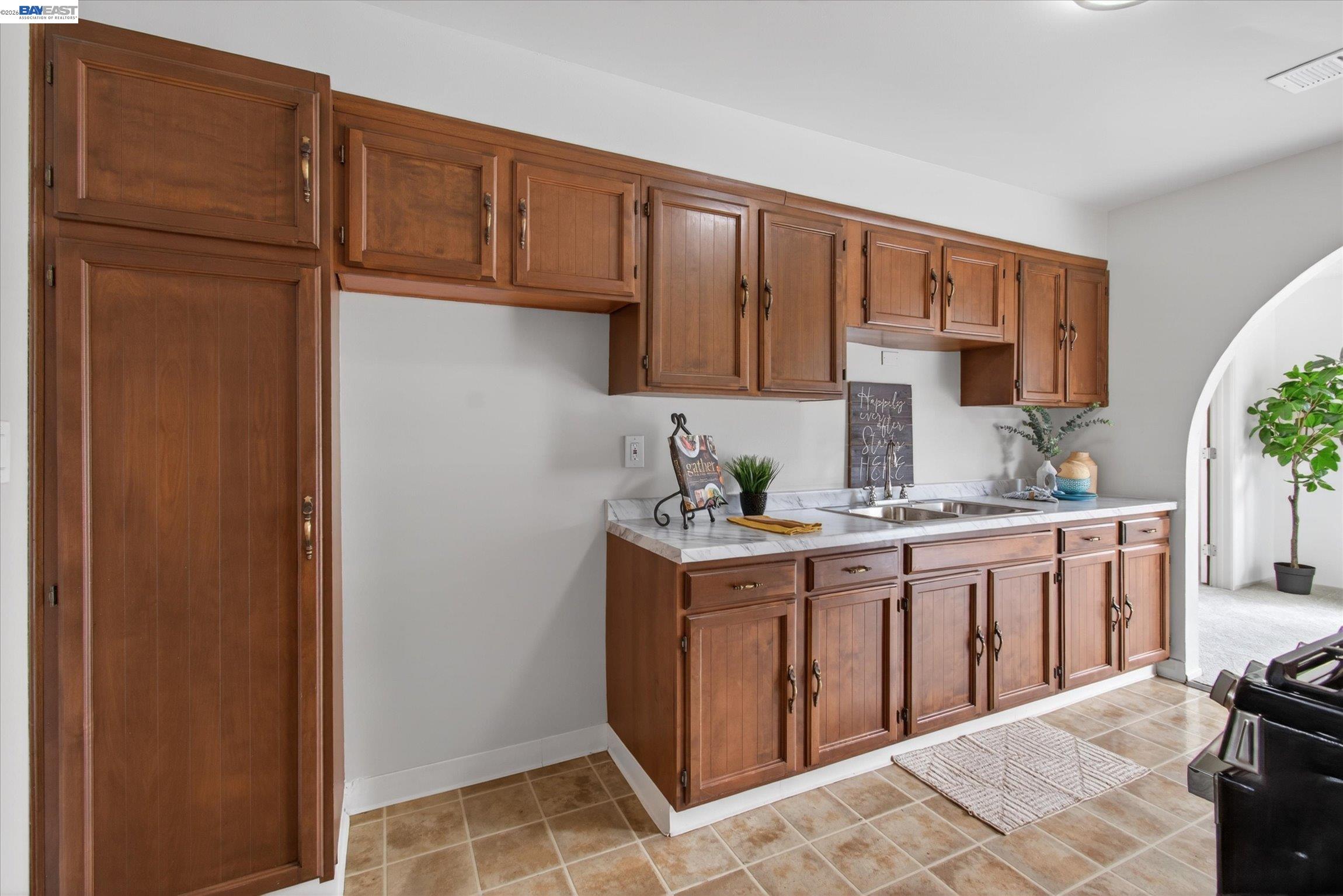 910 Miller Avenue Vallejo, CA 94591 - Photo 12 of 27 a kitchen with stainless steel appliances granite countertop a refrigerator and a sink