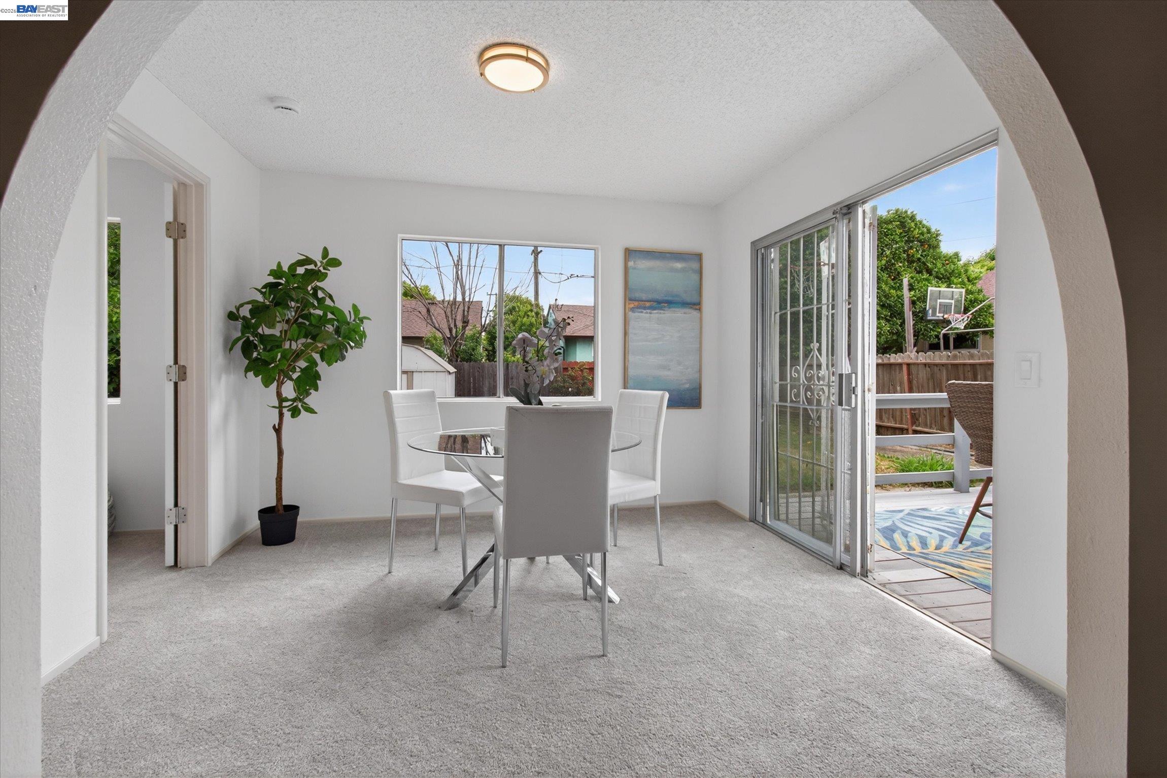 910 Miller Avenue Vallejo, CA 94591 - Photo 13 of 27 a living room with furniture and a potted plant