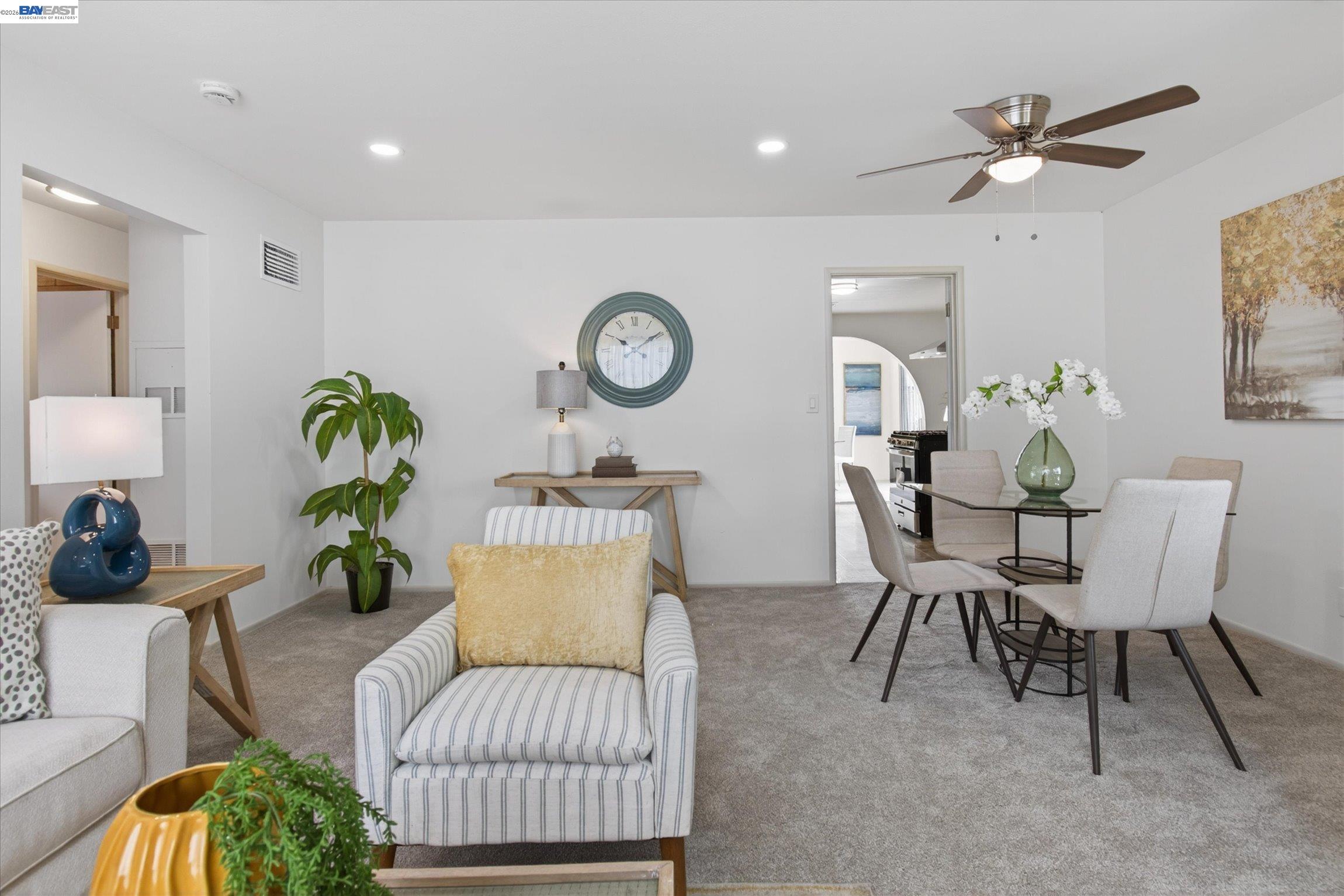 910 Miller Avenue Vallejo, CA 94591 - Photo 8 of 27 a living room with furniture a clock and a window
