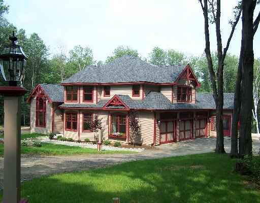 193 Goodhouse Road Litchfield, CT 06759 - Photo 1 of 1 a front view of a house with a garden