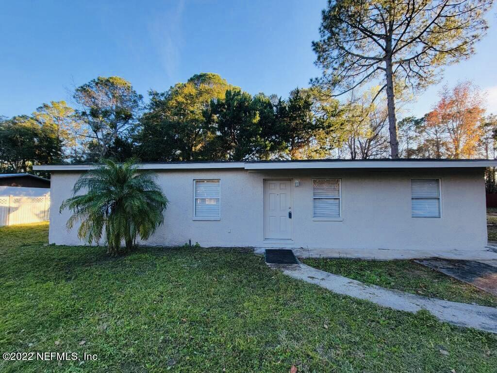 289 Las Olas Road St. Augustine, FL 32084 - Photo 14 of 14 a view of a yard with a tree