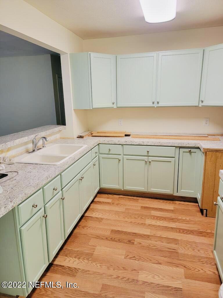 289 Las Olas Road St. Augustine, FL 32084 - Photo 2 of 14 a view of a kitchen with cabinets