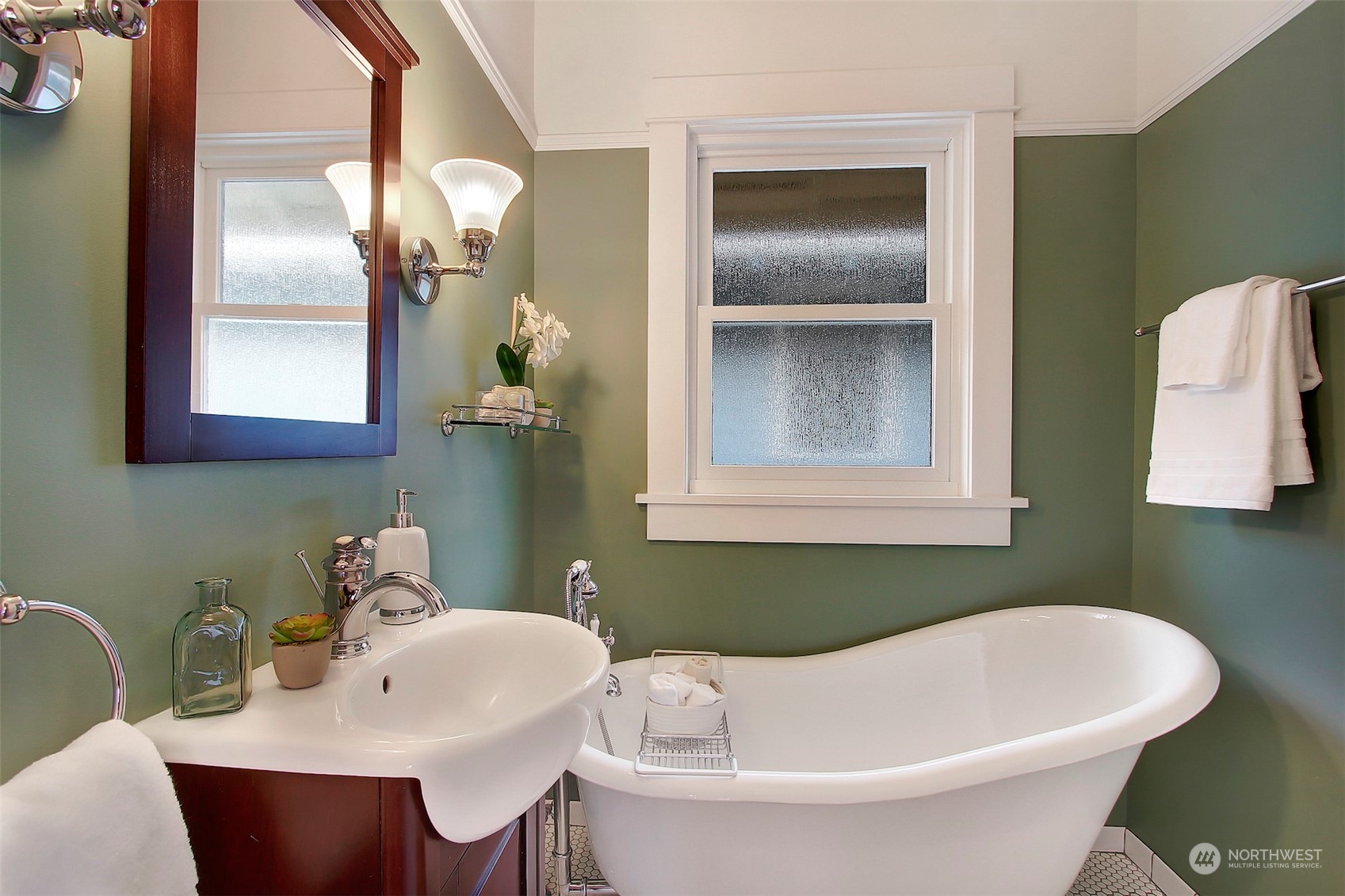 3912 Burke Avenue North Seattle, WA 98103 - Photo 11 of 39 a bathroom with a sink and a mirror