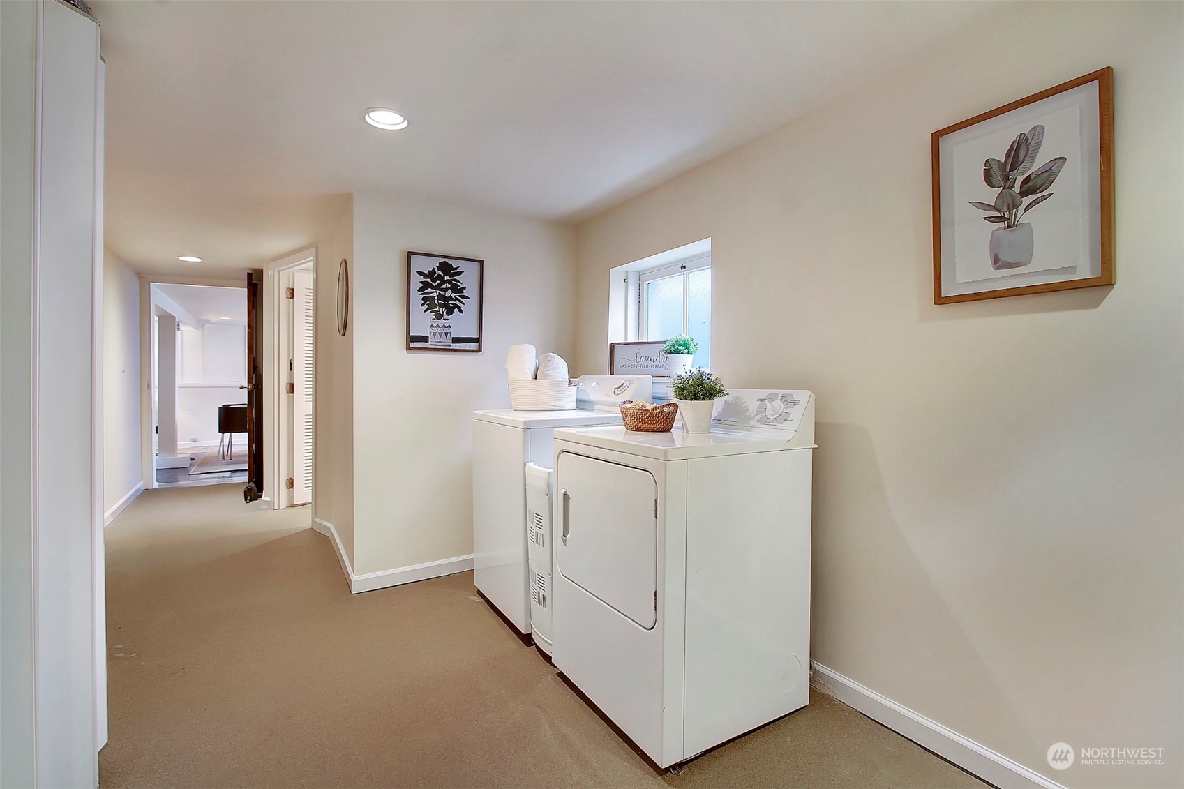 3912 Burke Avenue North Seattle, WA 98103 - Photo 20 of 39 a view of a hallway with workspace