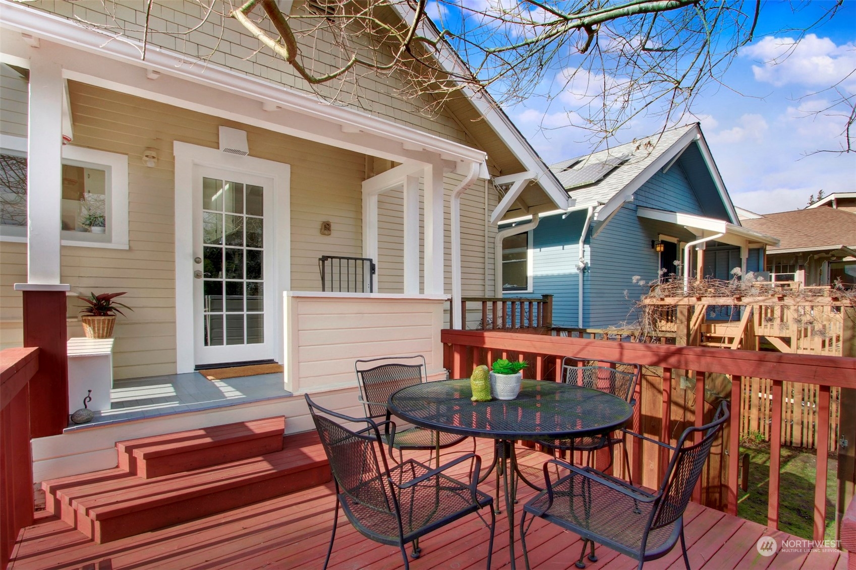 3912 Burke Avenue North Seattle, WA 98103 - Photo 25 of 39 a view of a house with backyard and sitting area