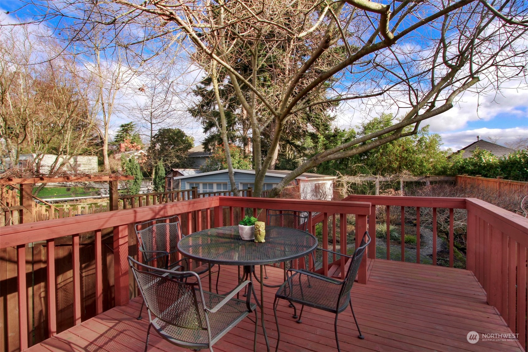 3912 Burke Avenue North Seattle, WA 98103 - Photo 28 of 39 a view of balcony with wooden floor and outdoor seating