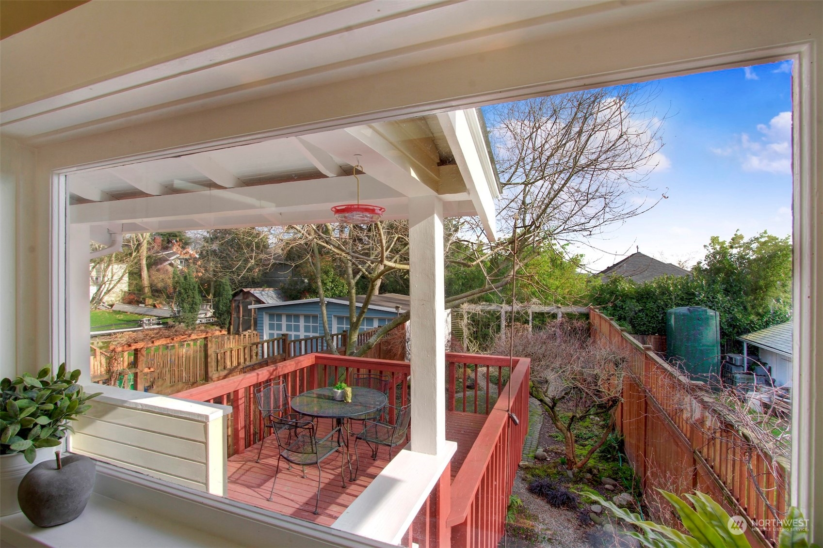 3912 Burke Avenue North Seattle, WA 98103 - Photo 29 of 39 a view of a deck with couches table and chairs