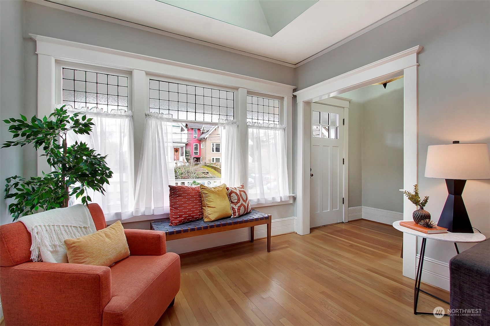 3912 Burke Avenue North Seattle, WA 98103 - Photo 3 of 39 a living room with furniture and a potted plant
