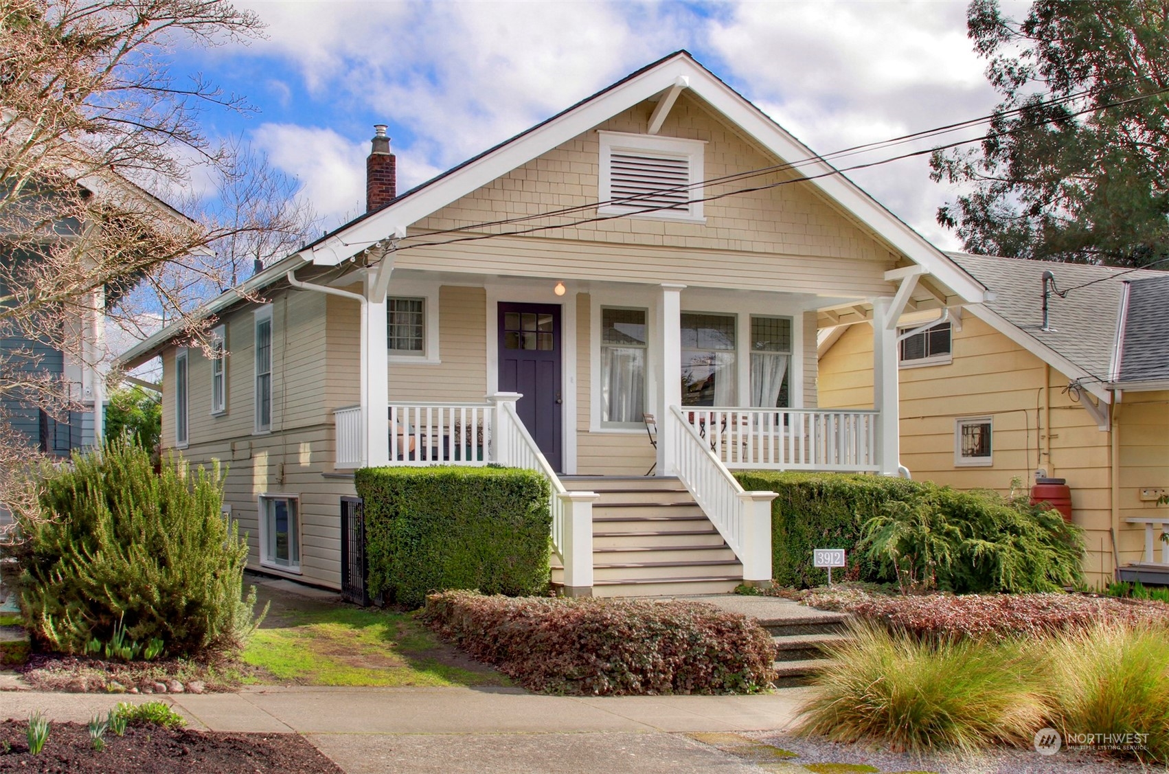 3912 Burke Avenue North Seattle, WA 98103 - Photo 37 of 39 a view of a house with a yard