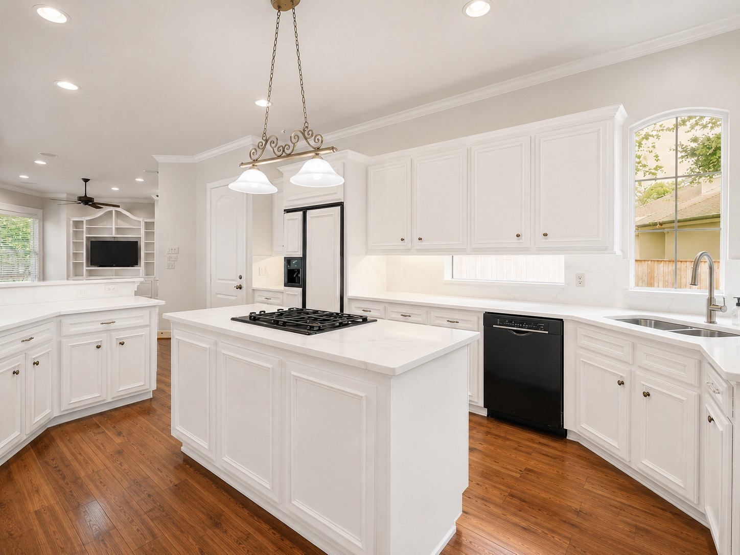 15 Lochbury Court Spring, TX 77379 - Photo 14 of 48 The kitchen opens directly into additional living spaces, ensuring a social atmosphere that is perfect for hosting large gatherings or keeping an eye on family activities.