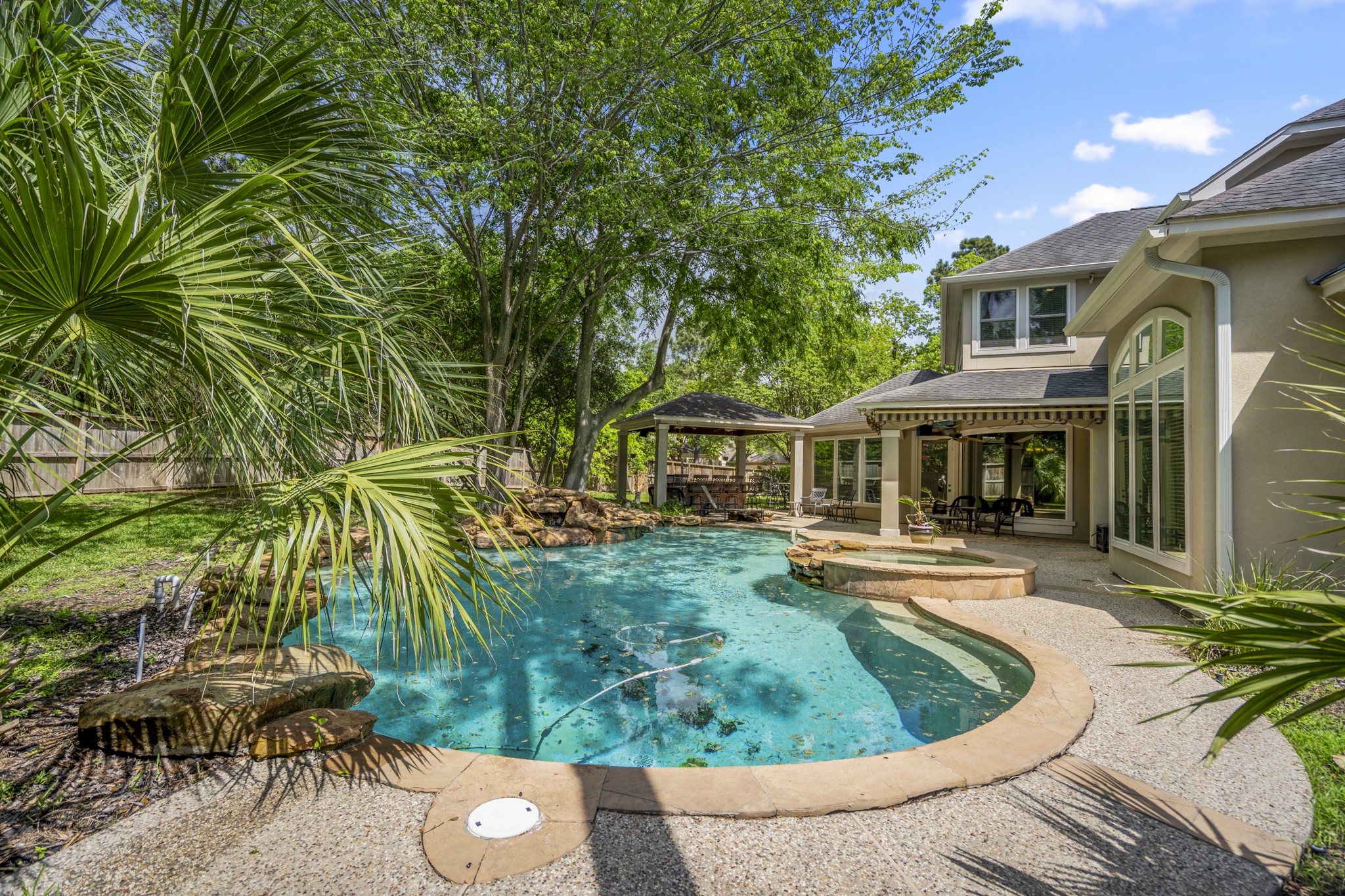 15 Lochbury Court Spring, TX 77379 - Photo 34 of 48 Enjoy the gorgeous back yard with sparkling pool & spa on private lot with no back neighbors, there is plenty of room for children and pets to play safely in the backyard.