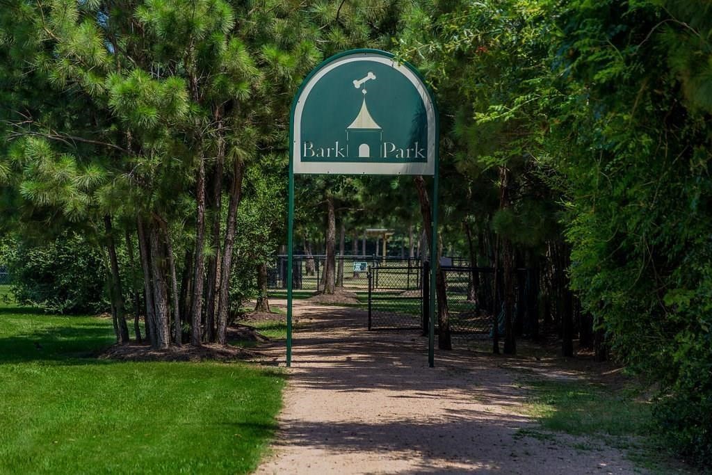 15 Lochbury Court Spring, TX 77379 - Photo 47 of 48 The BARK PARK where our 4-legged family members enjoy a 2.5-acre fenced dog park featuring separate areas for small & large dogs, trails, drinking fountains for pets and shaded seating for their owners.