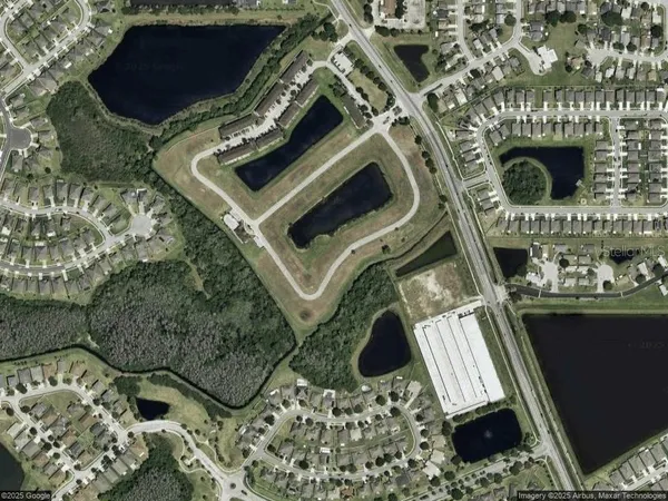 an aerial view of a fireplace with wooden floor