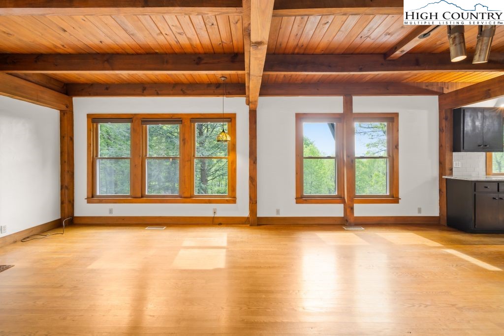 737 Tennant Road Newland, NC 28657 - Photo 11 of 38 a view of an empty room with a window