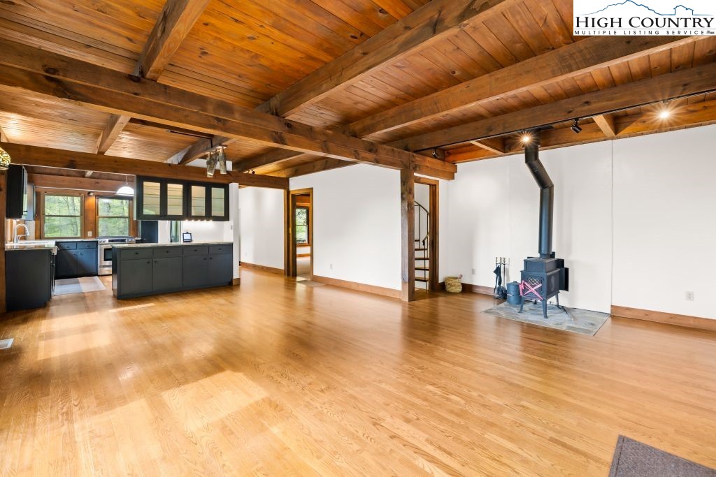 737 Tennant Road Newland, NC 28657 - Photo 17 of 38 a view of a studio with wooden floor