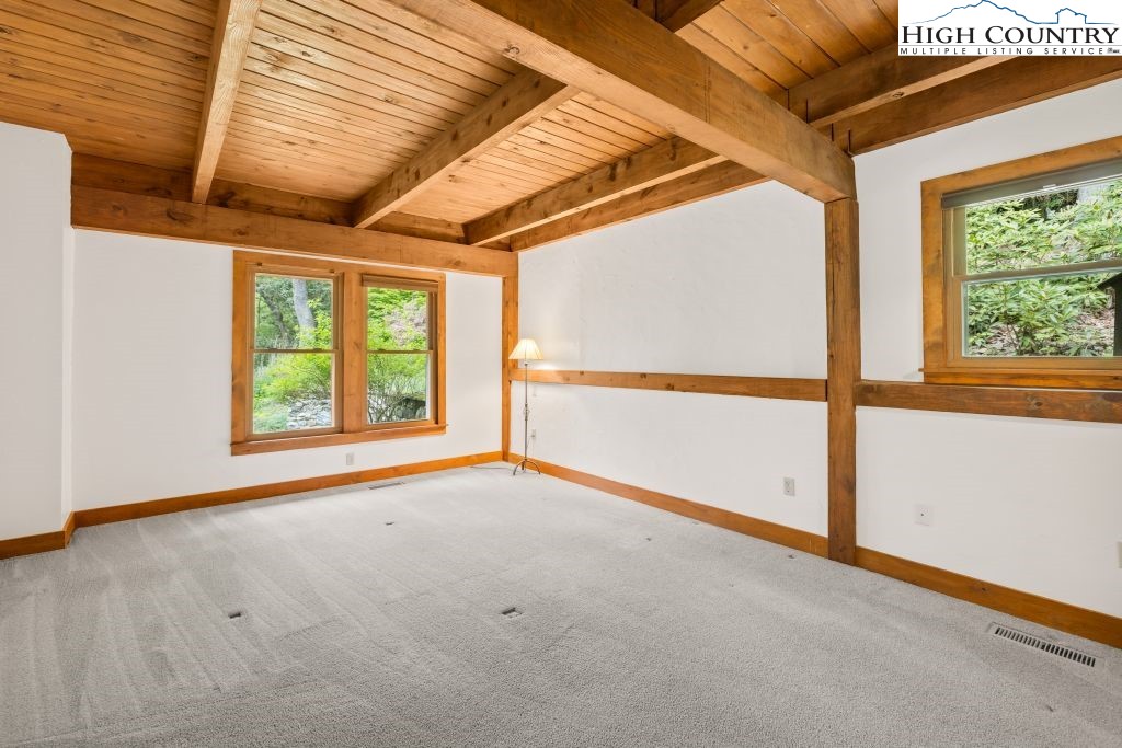 737 Tennant Road Newland, NC 28657 - Photo 18 of 38 a view of an empty room with a window