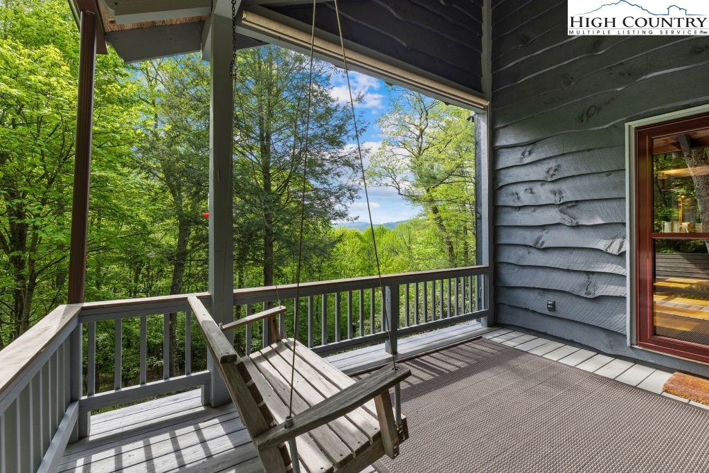737 Tennant Road Newland, NC 28657 - Photo 3 of 38 a view of a two chair in the balcony