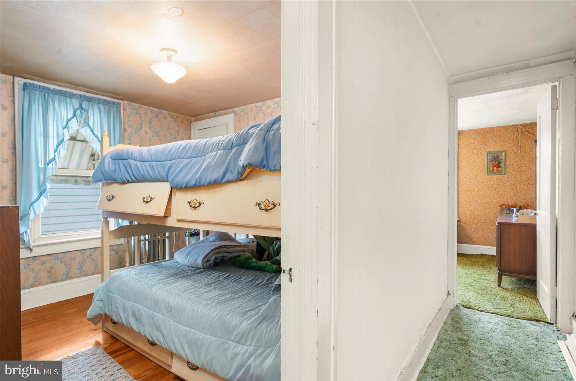 108 Fitzrandolph Avenue Hamilton, NJ 08610 - Photo 18 of 30 a bedroom with a bed and a table