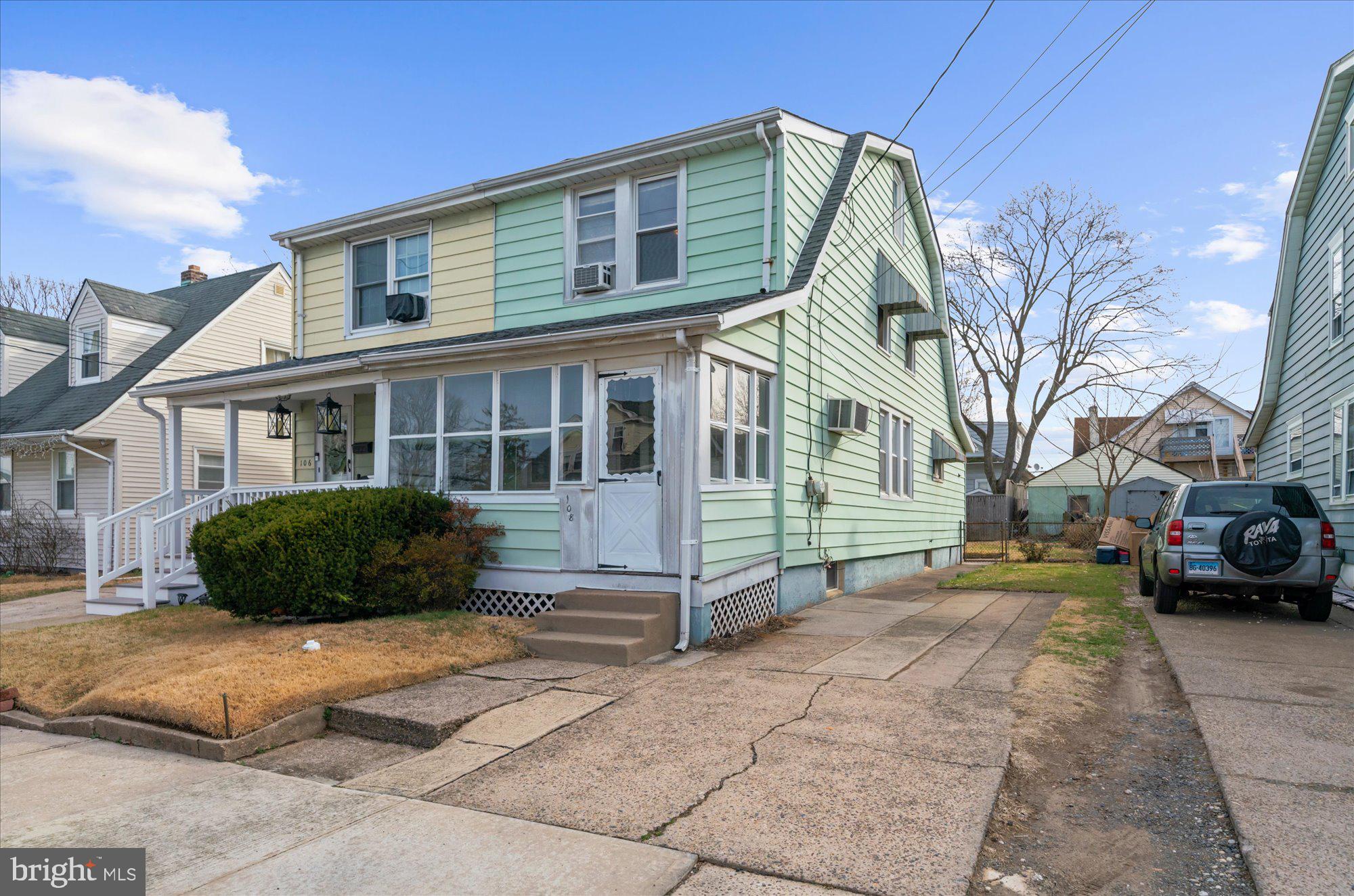 108 Fitzrandolph Avenue Hamilton, NJ 08610 - Photo 2 of 30 a front view of a house with a yard