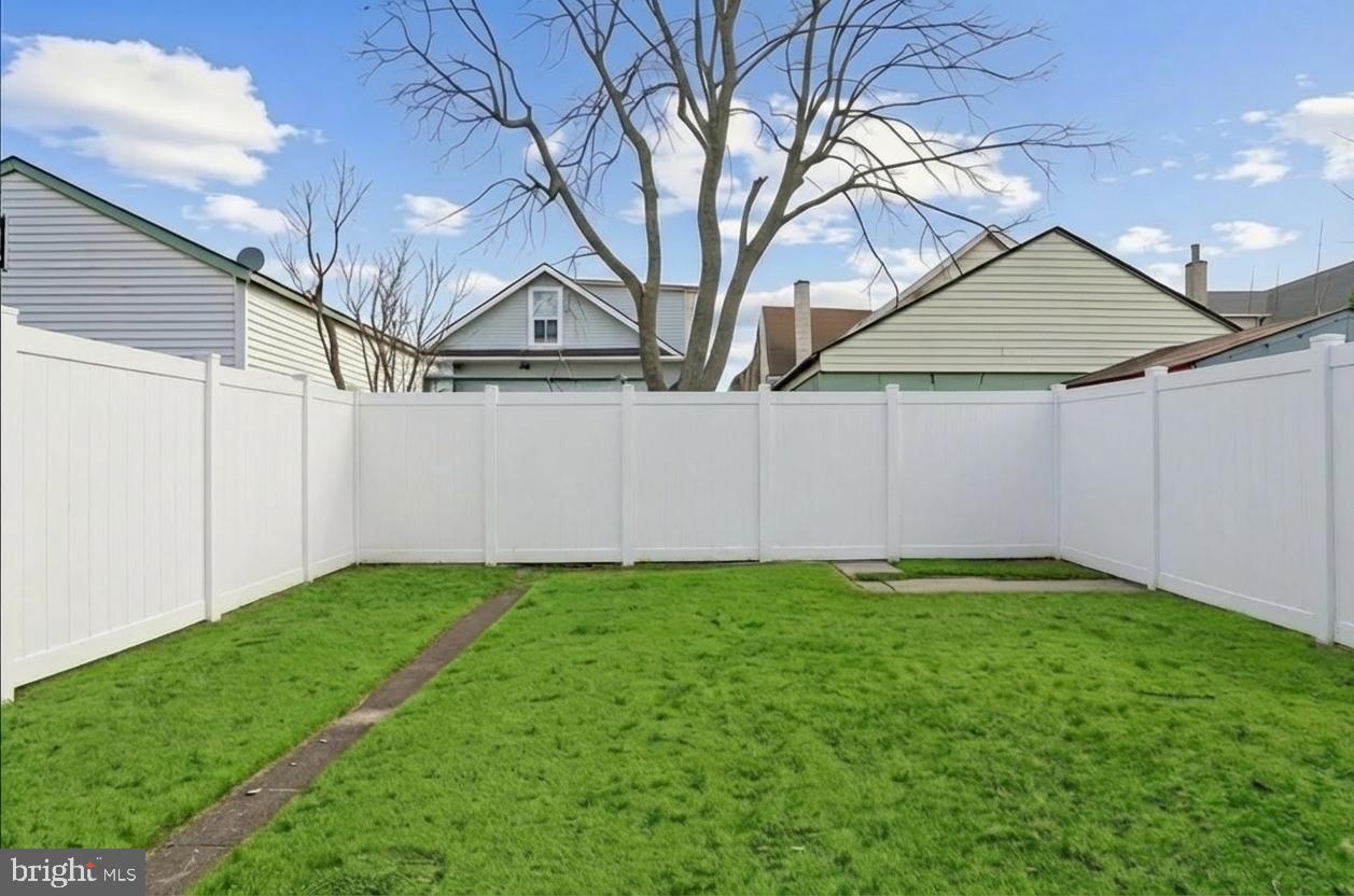 108 Fitzrandolph Avenue Hamilton, NJ 08610 - Photo 26 of 30 a view of a back yard of the house