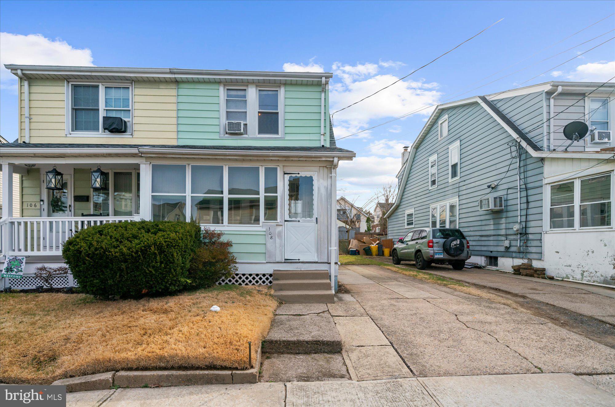 108 Fitzrandolph Avenue Hamilton, NJ 08610 - Photo 3 of 30 a front view of a house with a garden