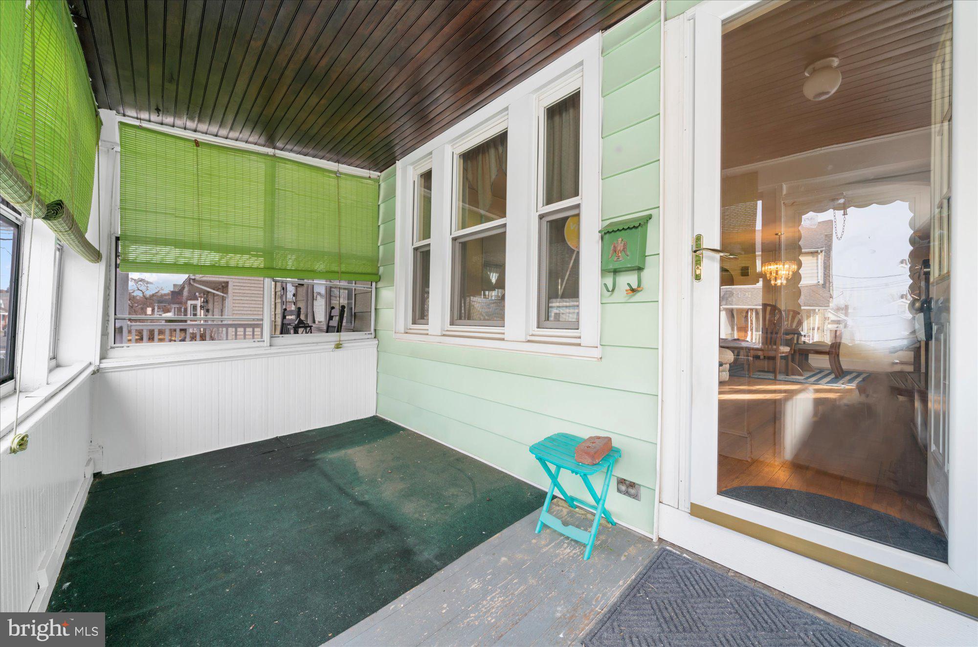 108 Fitzrandolph Avenue Hamilton, NJ 08610 - Photo 4 of 30 a view of porch with a bench