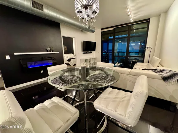a view of a dining room with furniture