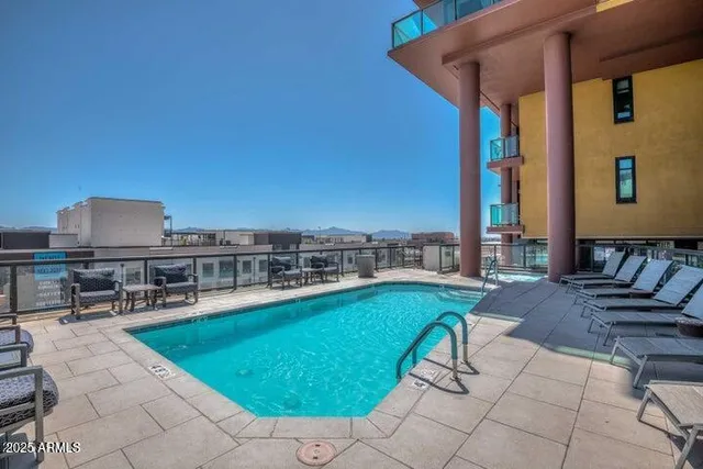 a view of a terrace with furniture
